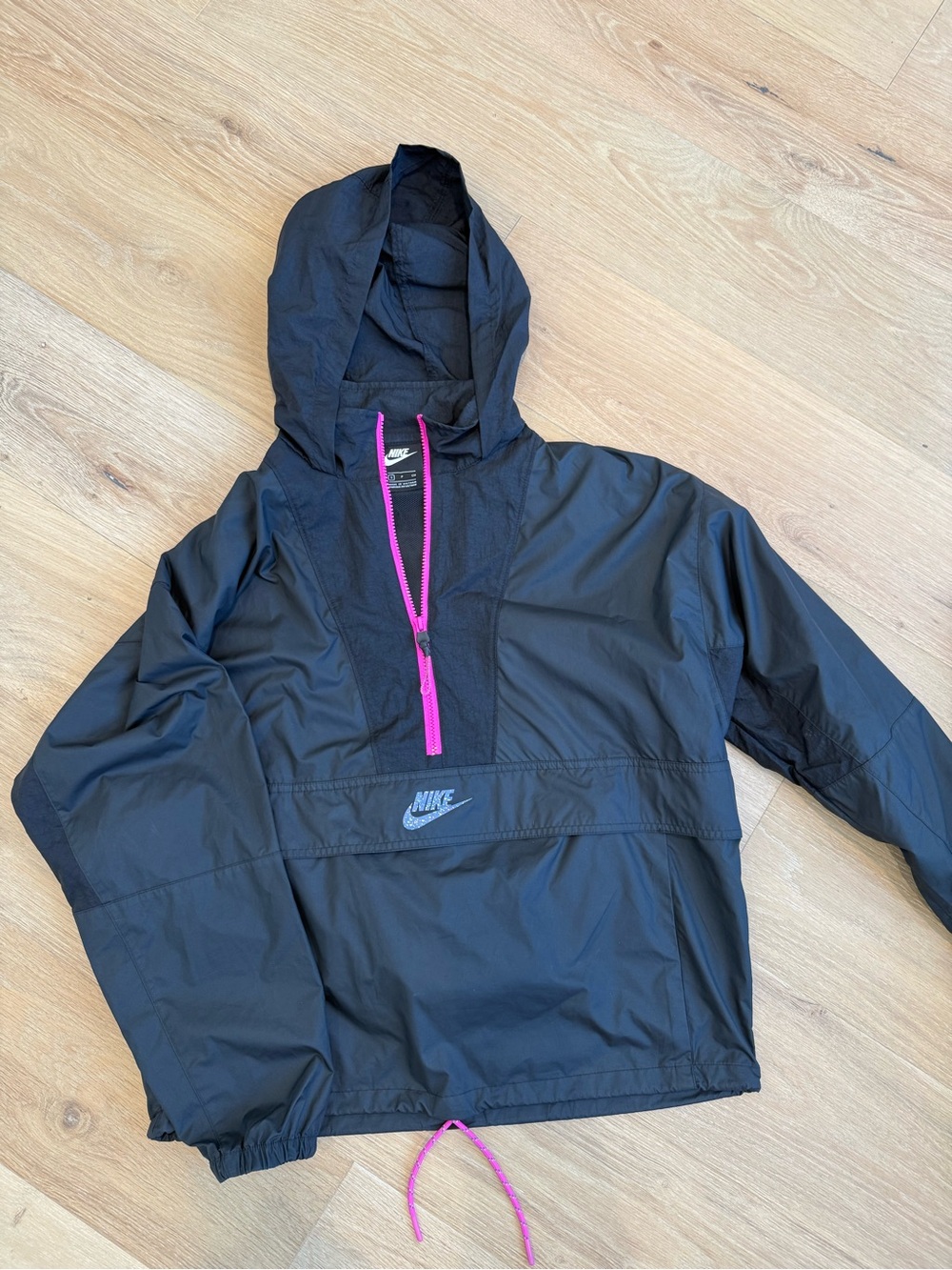Nike women’s Black Hooded Anorak with Pink Zip Pull